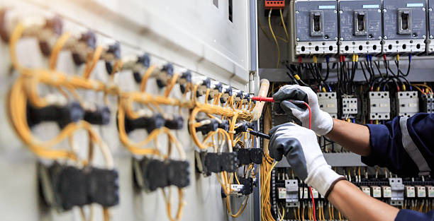 Professional Electrician technician working in Center Line, MI